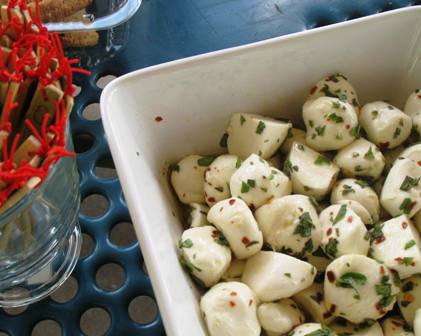 Bocconcini marinated in olive oil and spices
